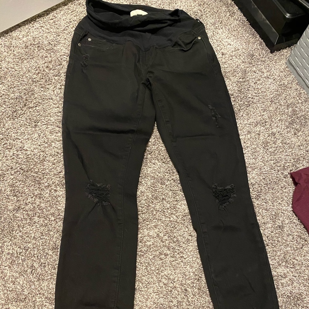 Distressed black maternity jeans with raw hem